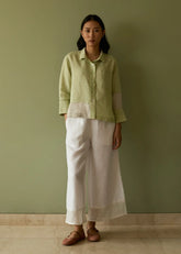 A Model Wearing Green Linen Tia Stripe Linen Co-Ord Set- Meadow, curated by Only Ethikal