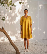 A Model Wearing Yellow Pure Cotton Warm Afternoon Dress curated by Only Ethikal
