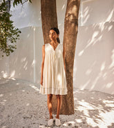 A Model Wearing White Pure Cotton White Mist Dress curated by Only Ethikal