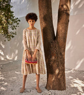 A Model Wearing Beige Linen Spring Dream Dress curated by Only Ethikal