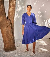 A Model Wearing Blue Pure Cotton Bustling Wind Dress curated by Only Ethikal