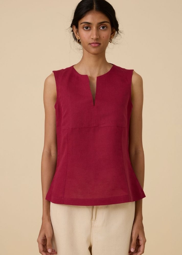 A Model Wearing Red Linen Umina Cherry Top , curated by Only Ethikal