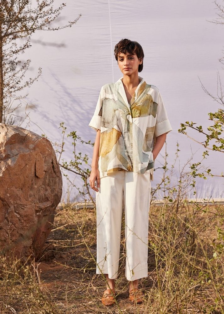 A Model Wearing White Cotton Mul Verdure co ord set curated by Only Ethikal