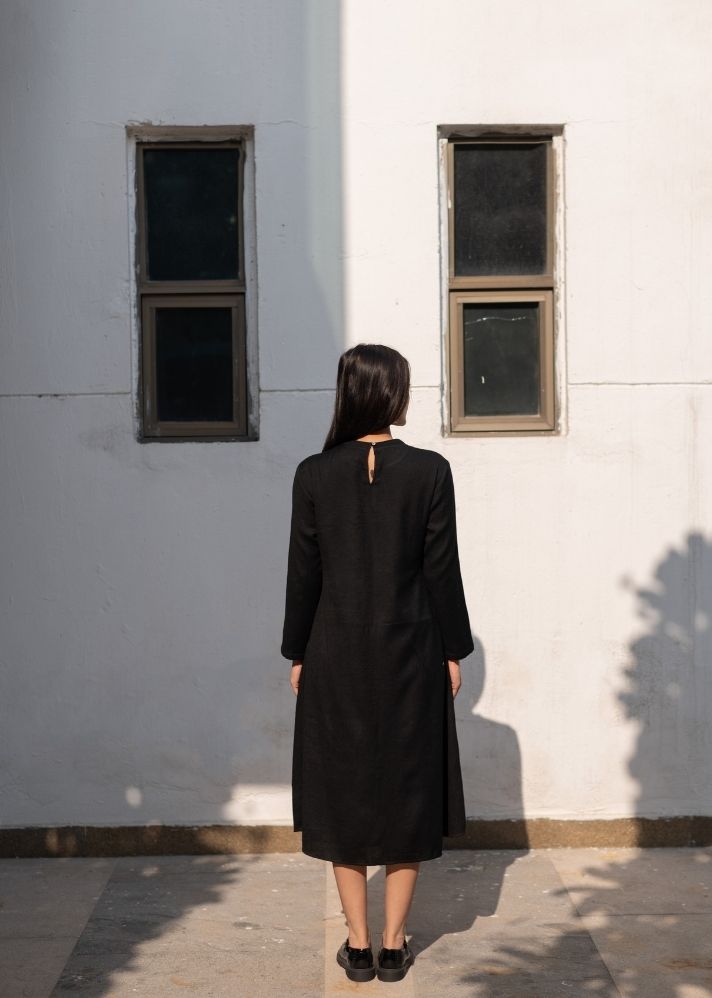 A Model Wearing Black Wool Black Starflowerdress , curated by Only Ethikal