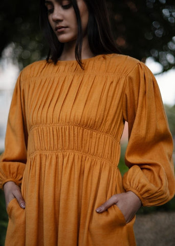 A Model Wearing Yellow Wool Sunflower Dress , curated by Only Ethikal
