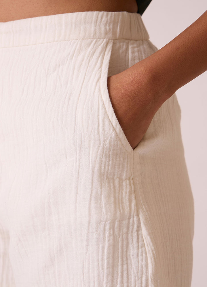 A Model Wearing White Organic Cotton Dora Crinkle Cotton Shorts , curated by Only Ethikal