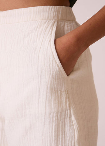A Model Wearing White Organic Cotton Dora Crinkle Cotton Shorts , curated by Only Ethikal