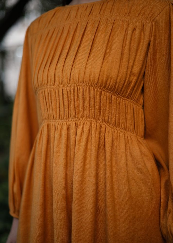 A Model Wearing Yellow Wool Sunflower Dress , curated by Only Ethikal