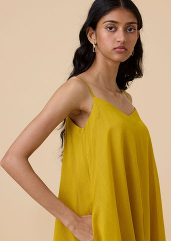 A Model Wearing Yellow Handwoven Cotton Inaya Yellow Handwoven Resort Dress , curated by Only Ethikal