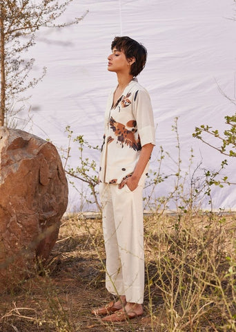 A Model Wearing White Cotton Mul Chidiya co ord set curated by Only Ethikal
