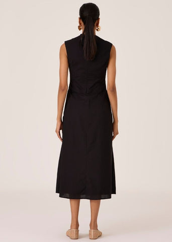 A Model Wearing Black Organic Cotton Ziva Black Pleated Midi Dress , curated by Only Ethikal