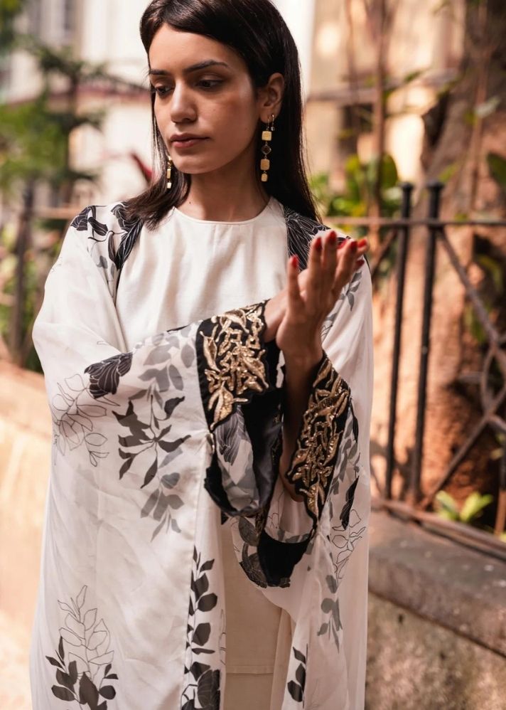 A Model Wearing White Pure Cotton Perry Long Jacket, curated by Only Ethikal