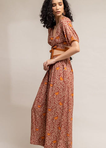 A Model Wearing Brown Upcycled Cotton  Rehno Printed Trousers, curated by Only Ethikal