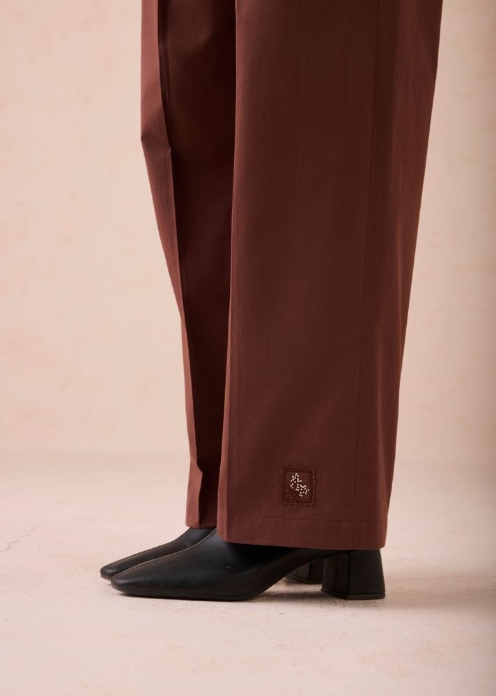 A Model Wearing Brown Cotton Twill The Bright Beginnings Organic Cotton Trousers, curated by Only Ethikal
