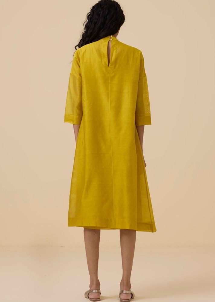 A Model Wearing Yellow Handwoven Cotton Aira Yellow Handwoven Embroidered Dress , curated by Only Ethikal