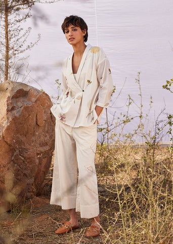A Model Wearing White Cotton Mul Ruyi co ord set curated by Only Ethikal