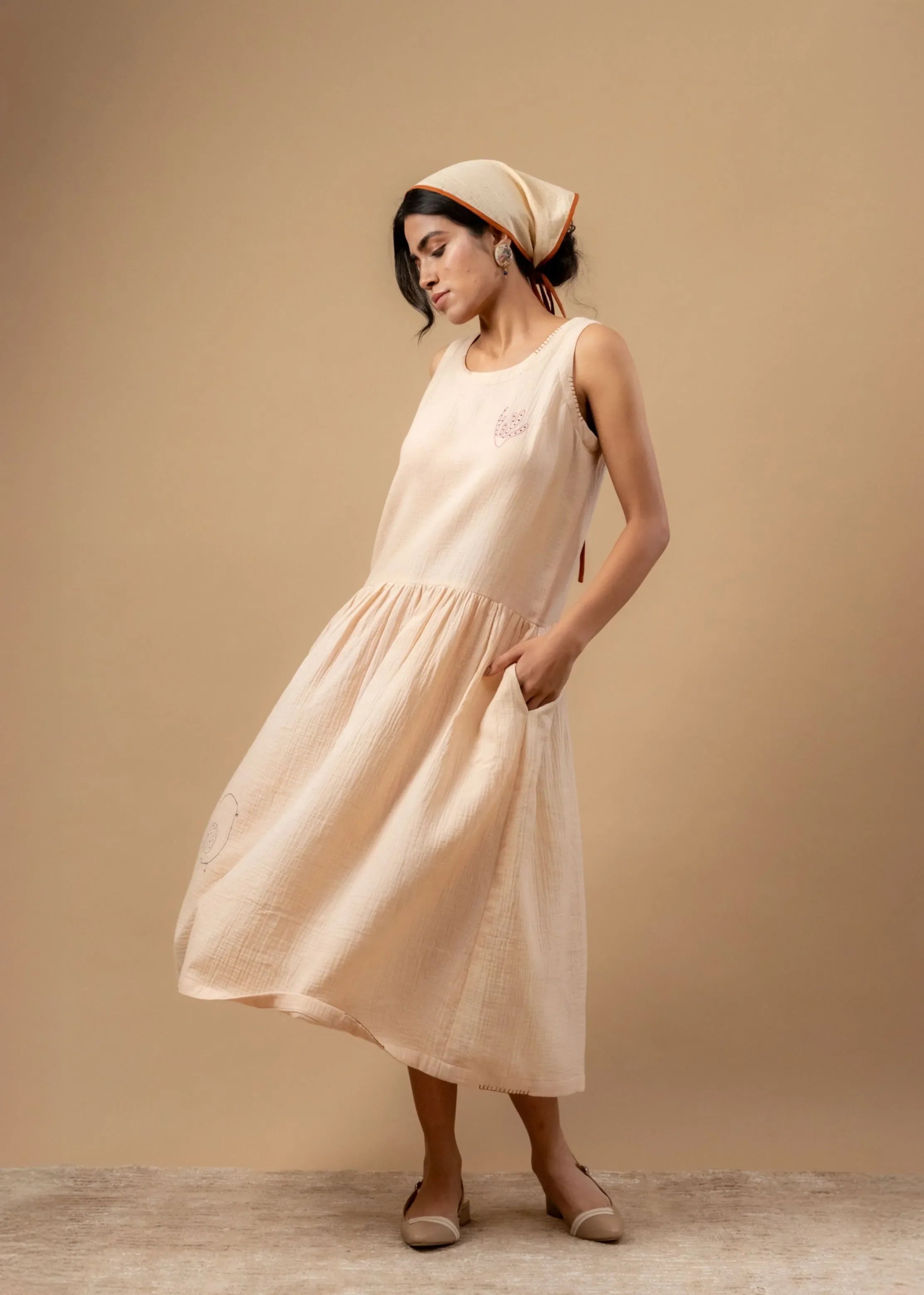 A Model Wearing Beige Organic Cotton Susan Drop Waist Dress, curated by Only Ethikal