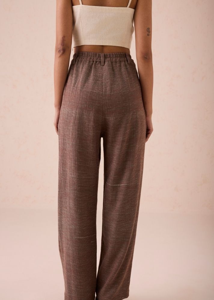 A Model Wearing Brown Handwoven Cotton The Hazel Sun Handspun Handwoven Organic Cotton Trousers, curated by Only Ethikal