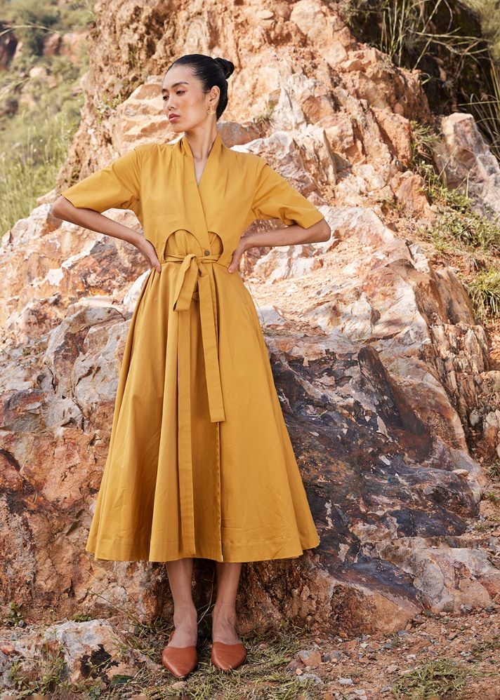 A Model Wearing Yellow Pure Cotton Those Days Midi Dress curated by Only Ethikal