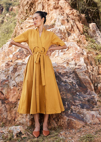 A Model Wearing Yellow Pure Cotton Those Days Midi Dress curated by Only Ethikal