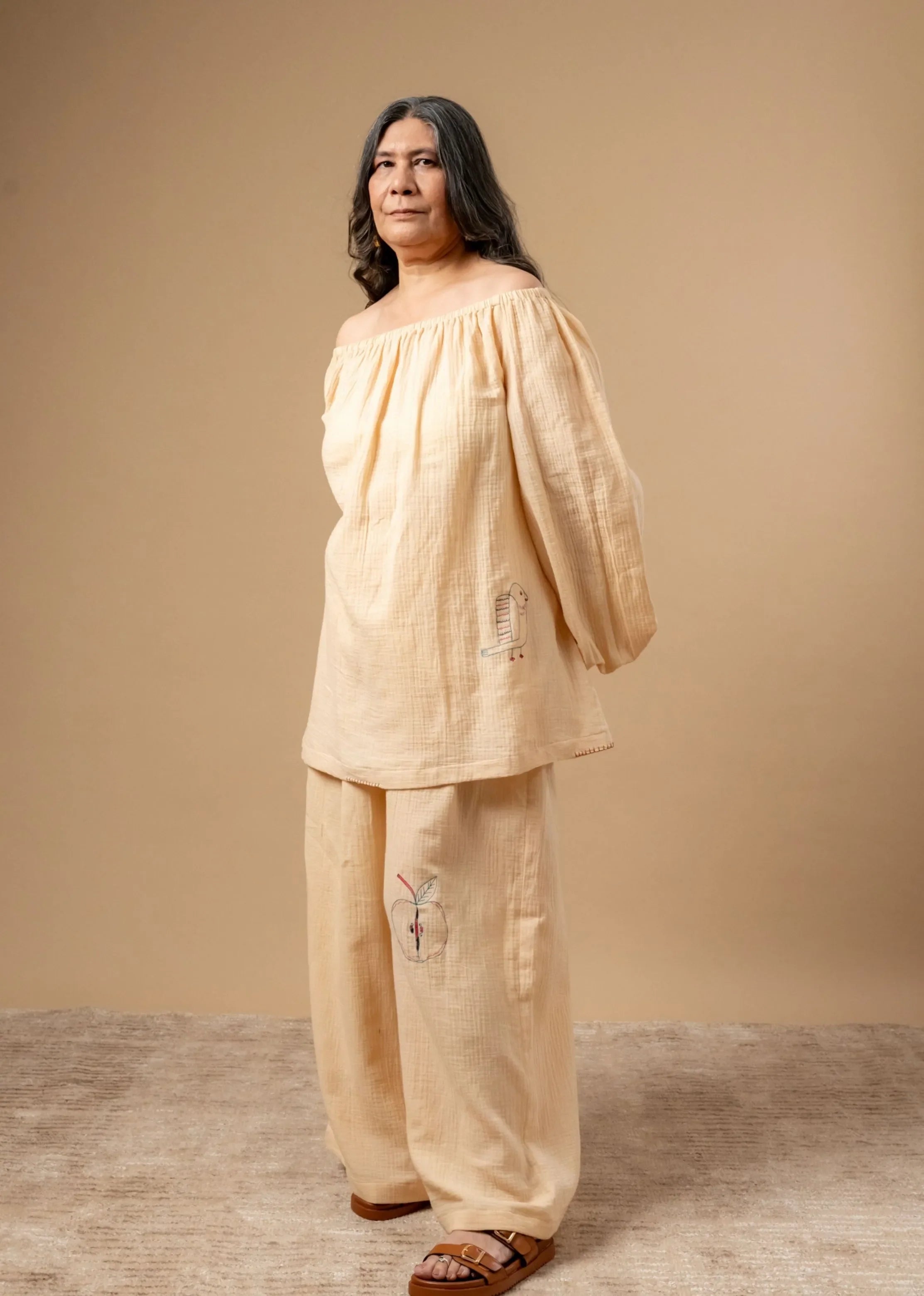 A Model Wearing Beige Organic Cotton Firefly Flicker Top, curated by Only Ethikal