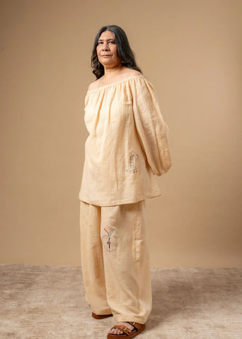 A Model Wearing Beige Organic Cotton Firefly Flicker Top, curated by Only Ethikal