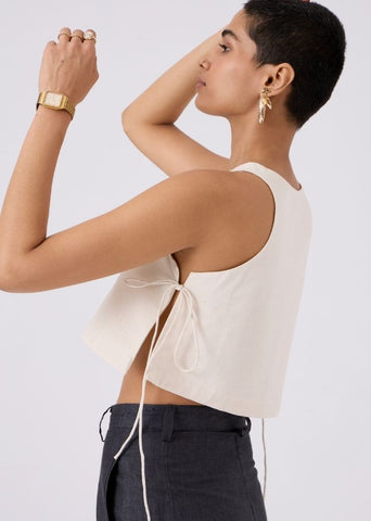 A Model Wearing White Handwoven Cotton Tia Cropped Handspun Khadi Tie Top, curated by Only Ethikal