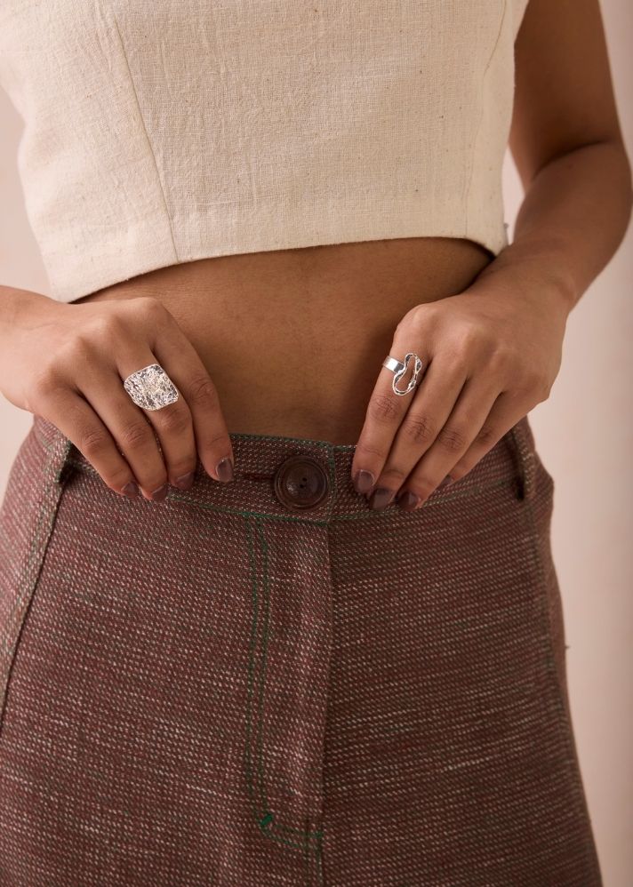 A Model Wearing Brown Handwoven Cotton The Hazel Sun Handspun Handwoven Organic Cotton Midi Skirt, curated by Only Ethikal