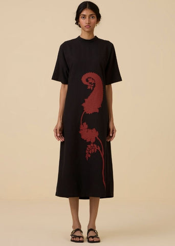 A Model Wearing Black Wool Cotton Ehan Black Hand Applique Dress , curated by Only Ethikal
