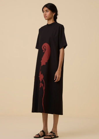 A Model Wearing Black Wool Cotton Ehan Black Hand Applique Dress , curated by Only Ethikal