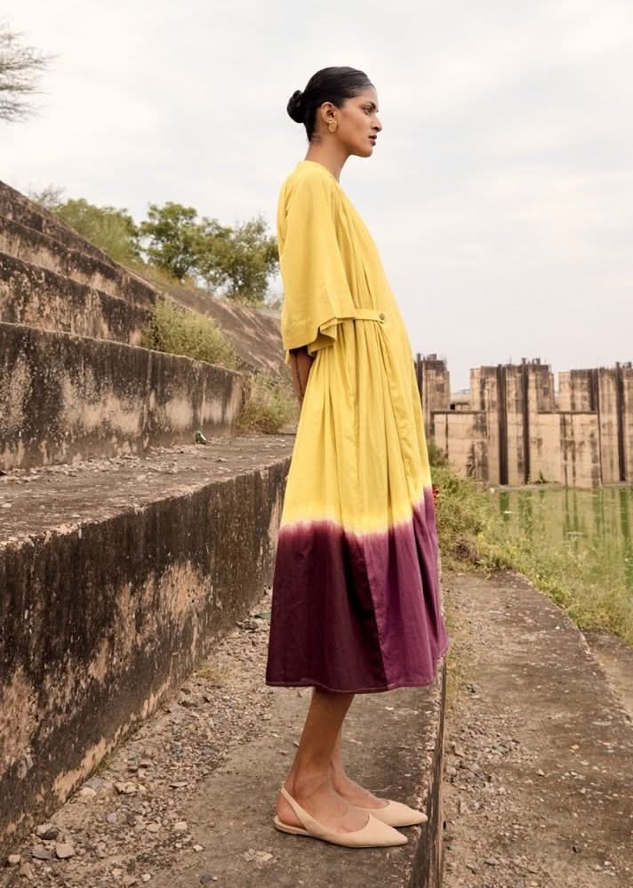 A Model Wearing White Pure Cotton Pomarine Dress curated by Only Ethikal