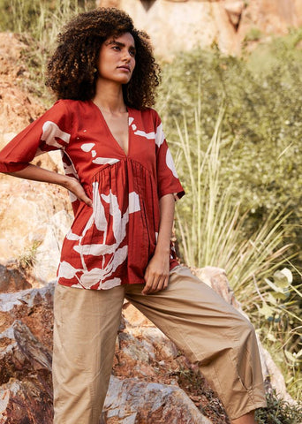 A Model Wearing Red Pure Cotton Bittersweet Top curated by Only Ethikal