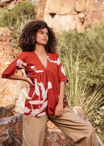 A Model Wearing Red Pure Cotton Bittersweet Top curated by Only Ethikal