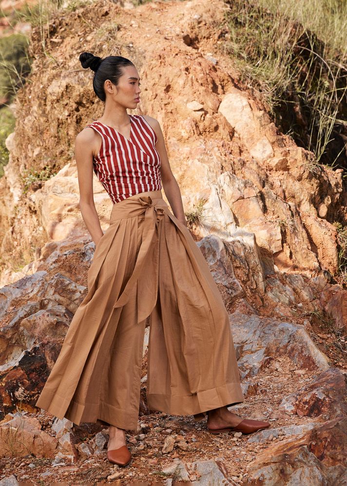 A Model Wearing Brown Pure Cotton Lost In Chase Pleated Trouser curated by Only Ethikal