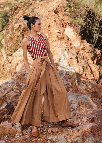 A Model Wearing Brown Pure Cotton Lost In Chase Pleated Trouser curated by Only Ethikal