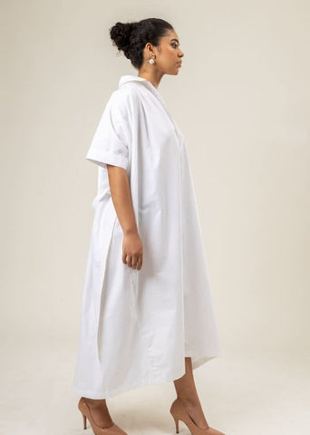 A Model Wearing White Upcycled Cotton Zora Dress, curated by Only Ethikal
