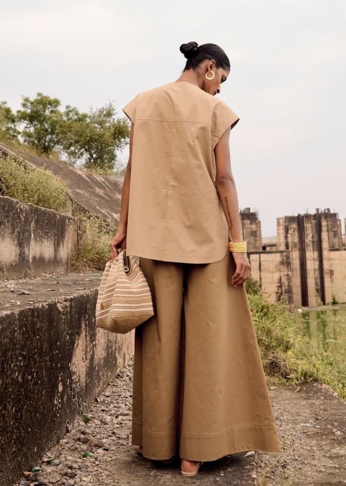 A Model Wearing Beige Pure Cotton Owlet Top curated by Only Ethikal