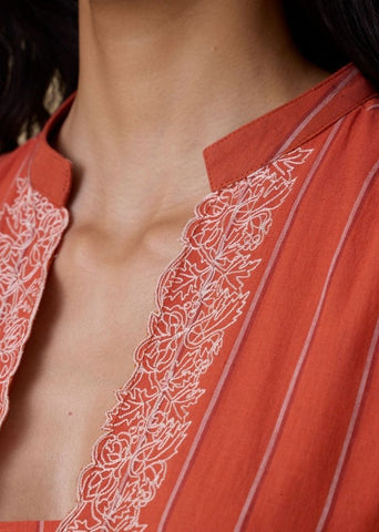 A Model Wearing Orange Handwoven Cotton Sabah Orange Cotton Striped Midi Dress , curated by Only Ethikal