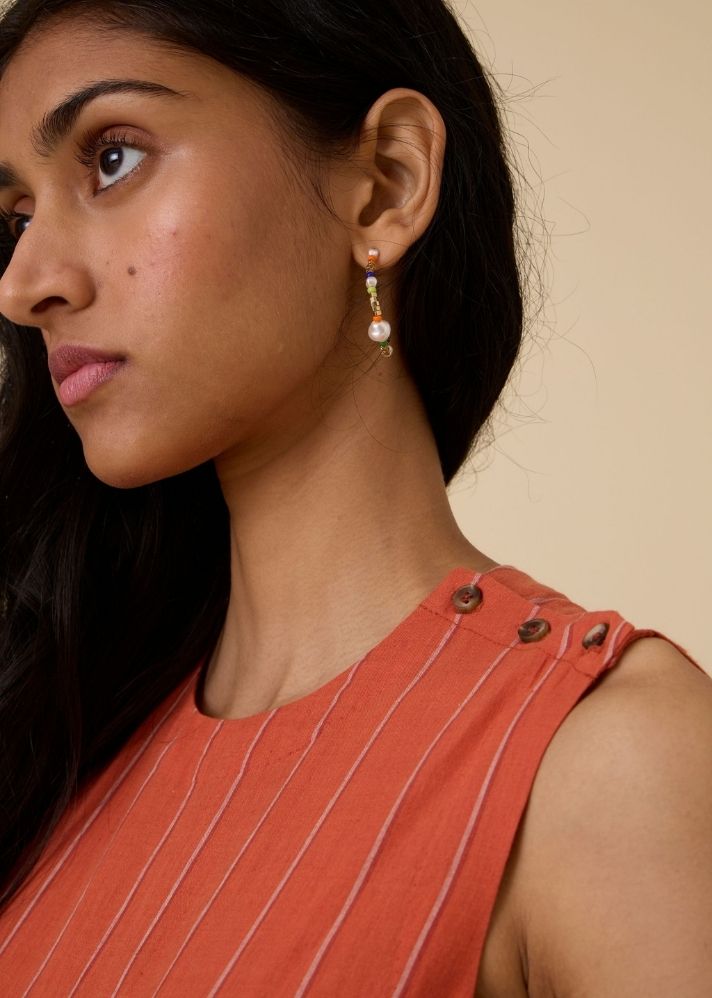 A Model Wearing Orange Handwoven Cotton Valentino Orange Cotton Midi Dress , curated by Only Ethikal