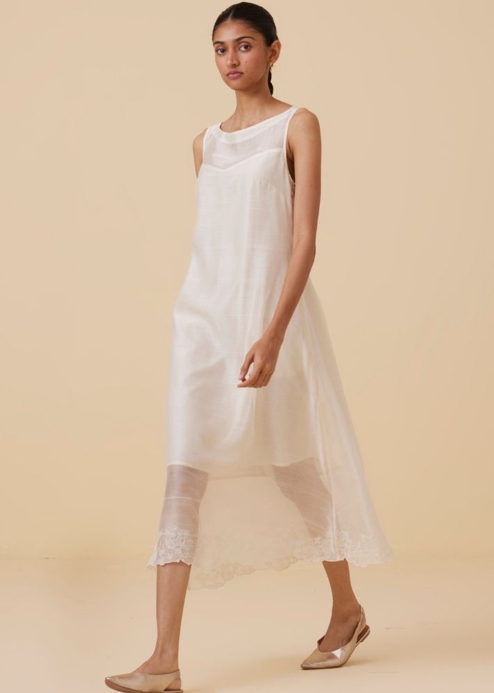 A Model Wearing White Handwoven Cotton Reyah Handwoven Embroidered Midi Dress , curated by Only Ethikal