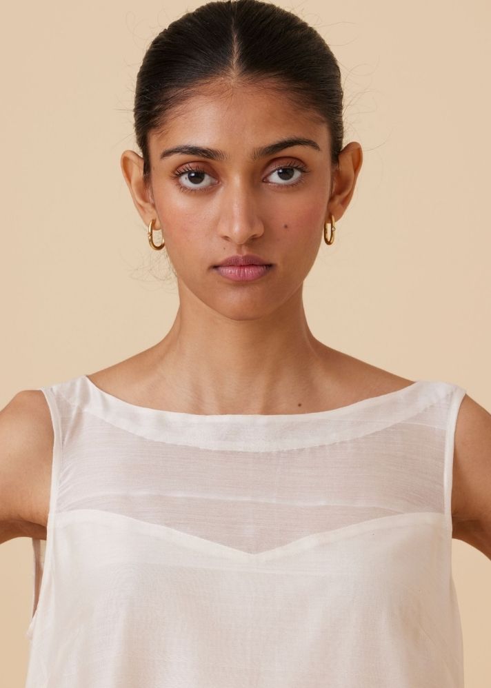 A Model Wearing White Handwoven Cotton Reyah Handwoven Embroidered Midi Dress , curated by Only Ethikal
