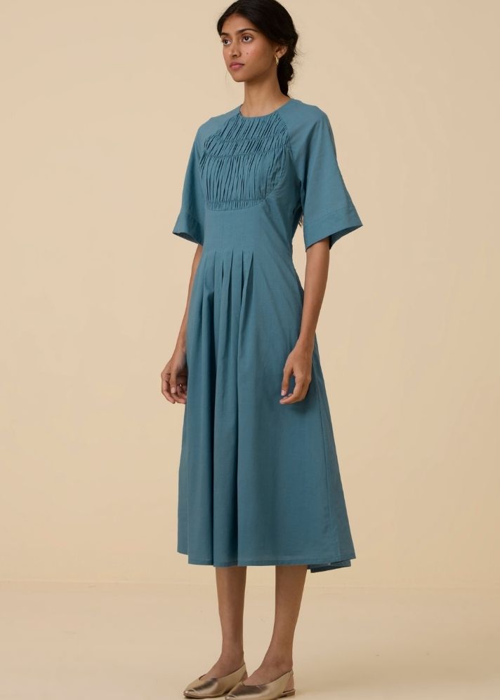 A Model Wearing Blue Organic Cotton Tamina Blue Cotton Midi Dress , curated by Only Ethikal