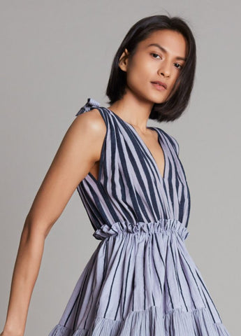 A Model Wearing  Purple Pure Cotton Lakeerein Lavender Frill Dress, curated by Only Ethikal