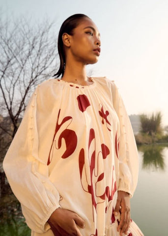 A Model Wearing Green Pure Cotton Crest Dress curated by Only Ethikal