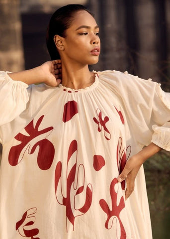 A Model Wearing Red Pure Cotton Eider Dress curated by Only Ethikal