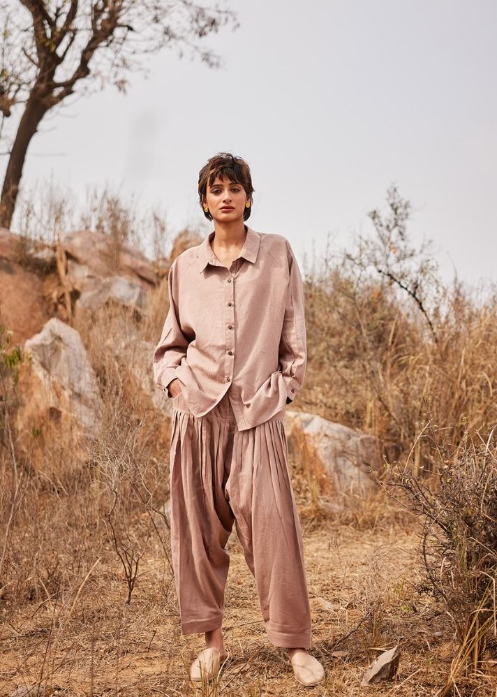 A Model Wearing White Cotton Mul Dune Shirt,curated by Only Ethikal