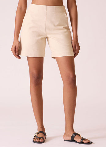 A Model Wearing White Handwoven Cotton Huruka Handwoven Denim Shorts, curated by Only Ethikal