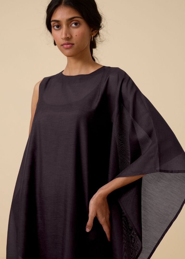 A Model Wearing Black Cotton silk Sansa Black Dress , curated by Only Ethikal