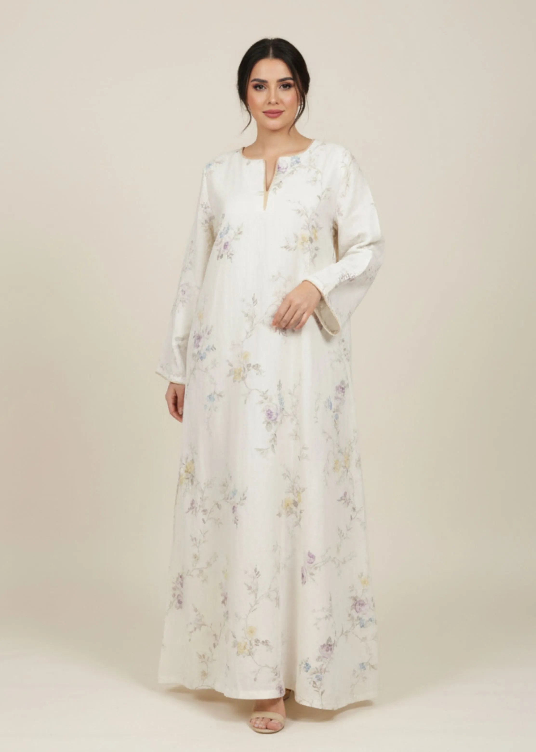 A Model Wearing Multicolor Linen Meadow Print White Jalabiya, created by Only Ethikal