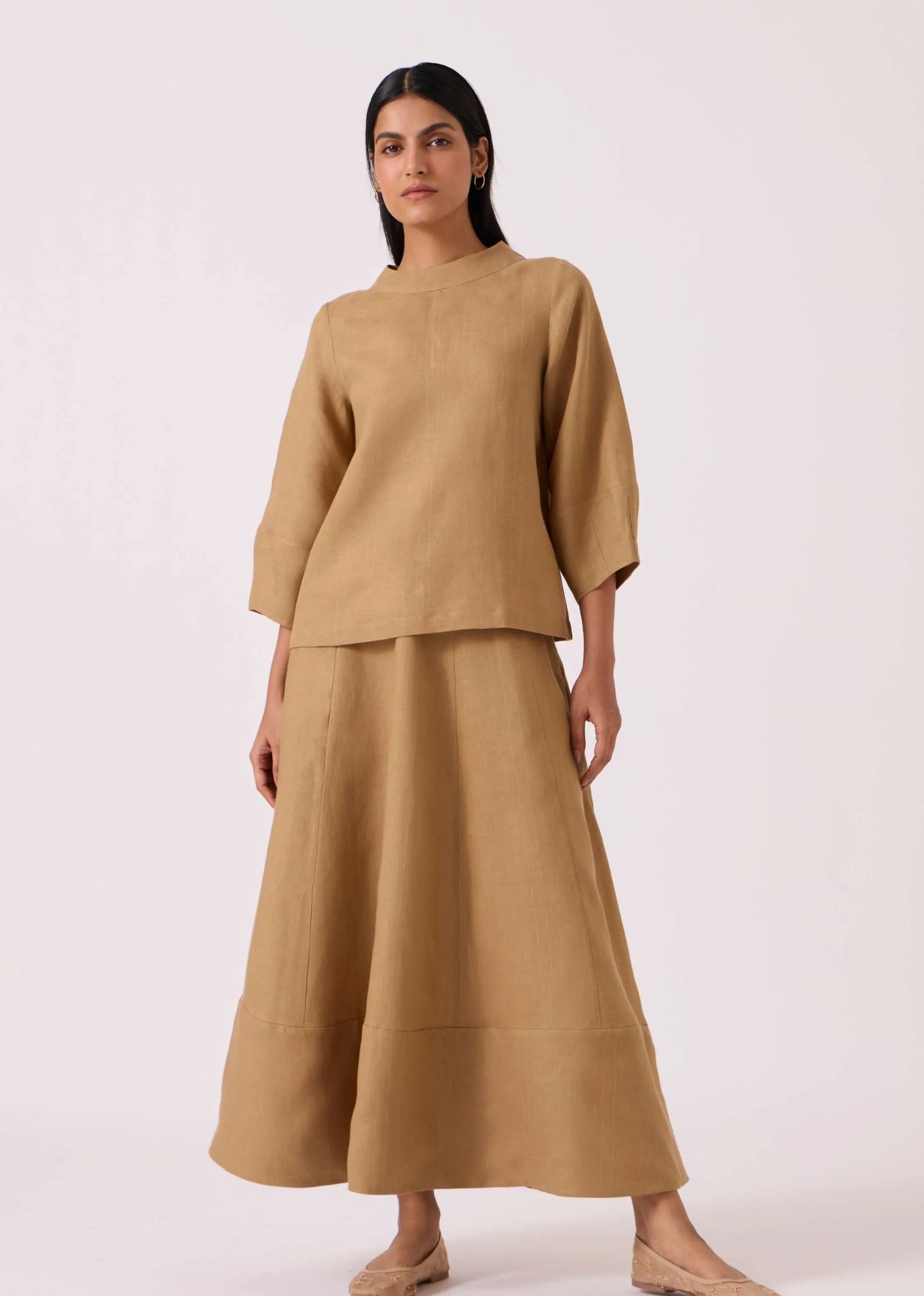 A Model Wearing Brown Linen Marner Tan Linen Skirt, curated by Only Ethikal